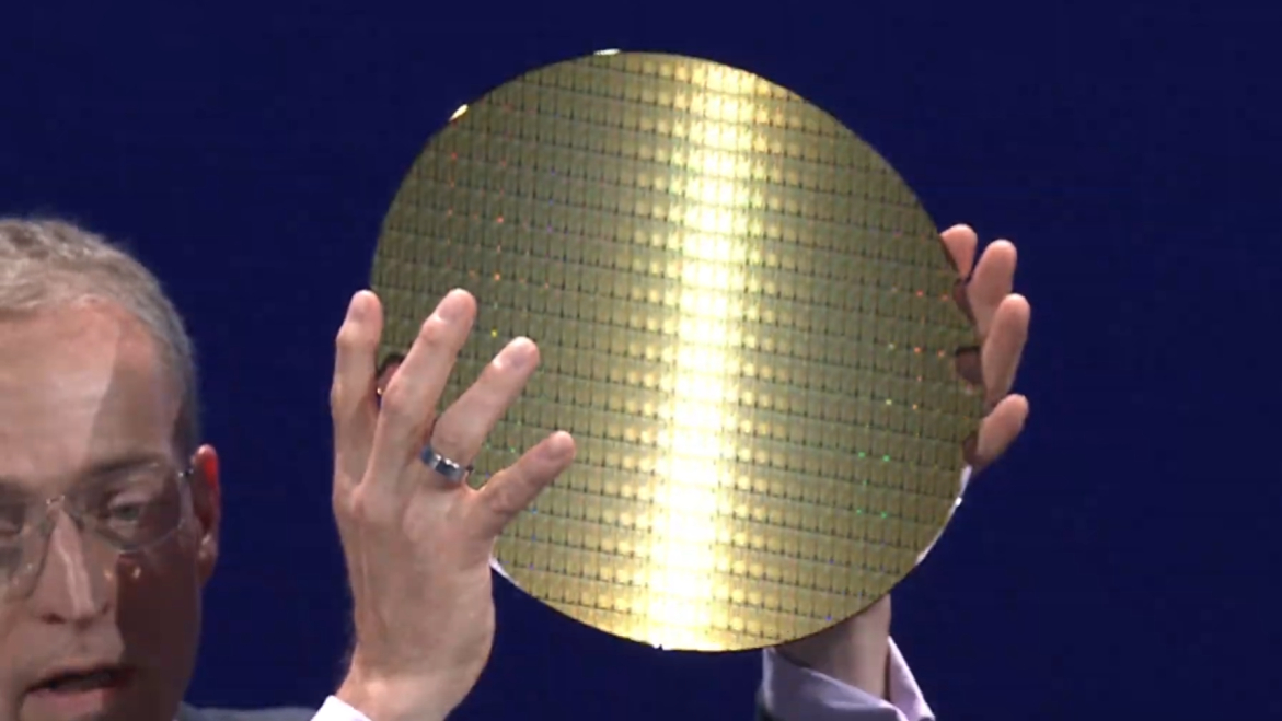 Intel CEO Pat Gelsinger holds a wafer at the Computex 2024 keynote